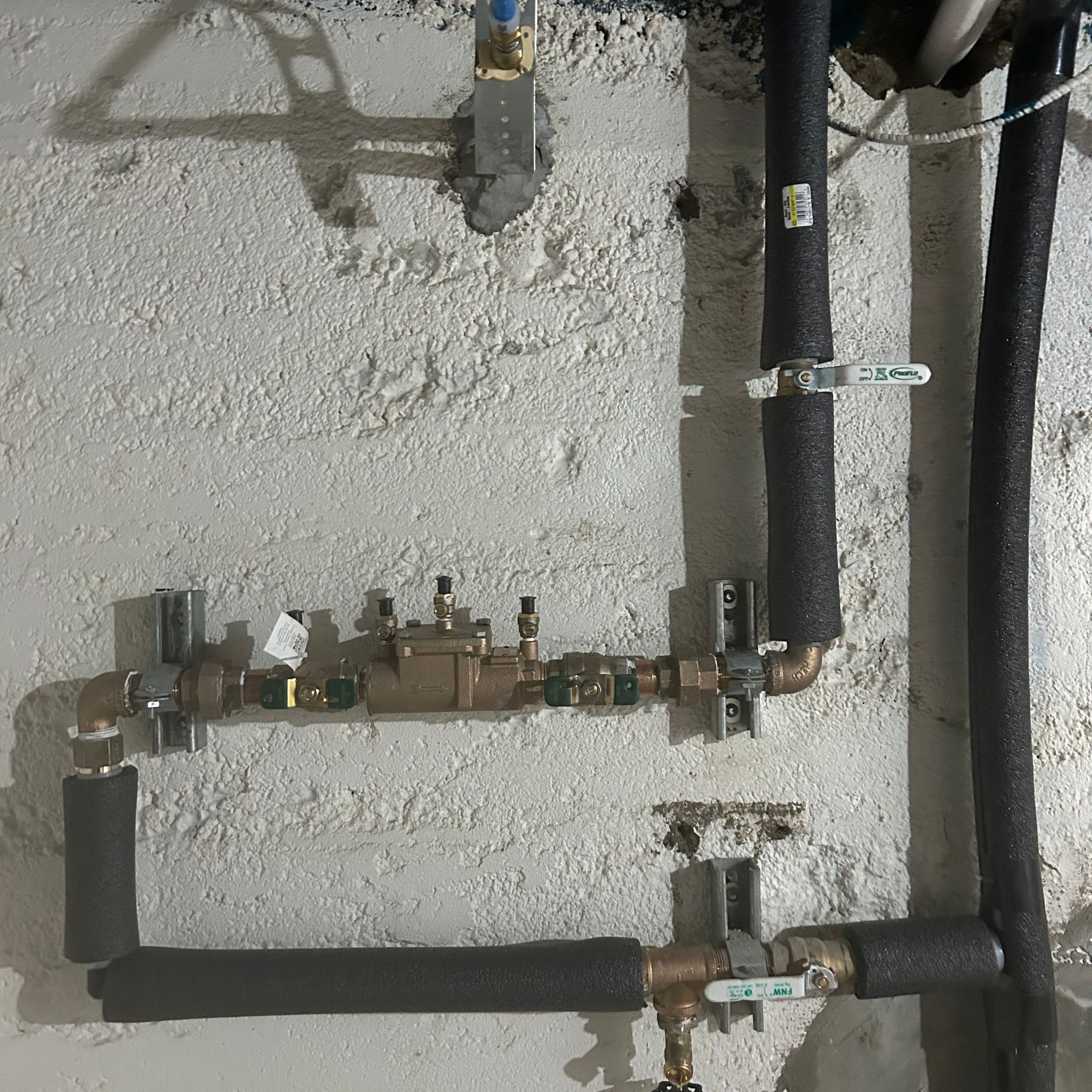 Pipework beneath a floor
