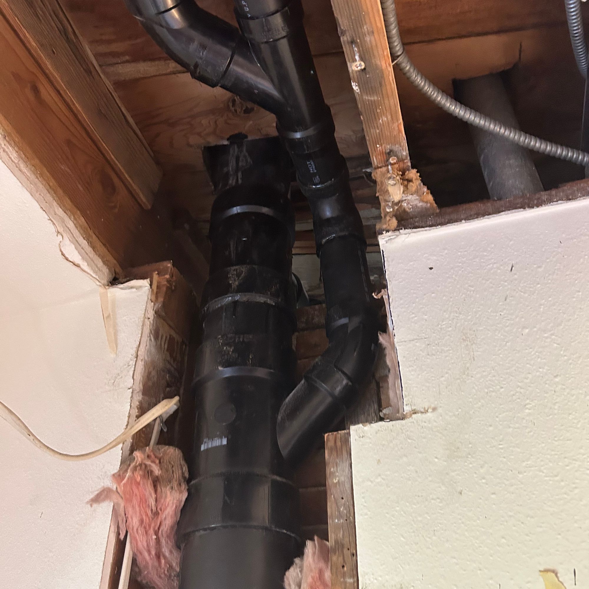 Drain piping in a ceiling